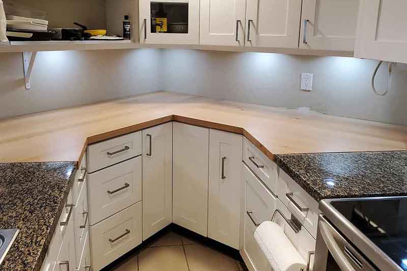 Stained oak wide plank kitchen top